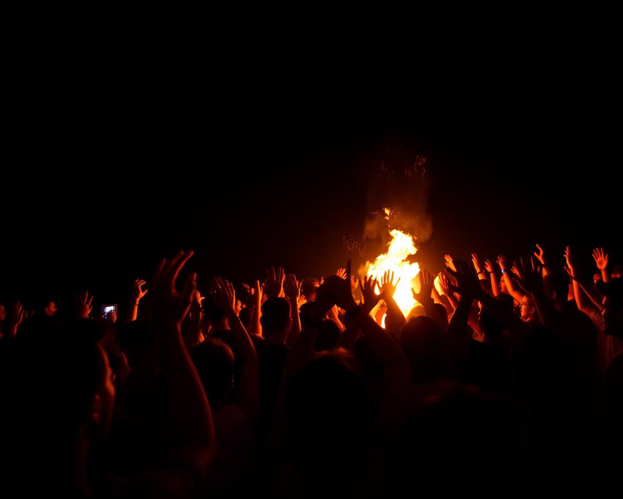 Crowd reacting at fire show